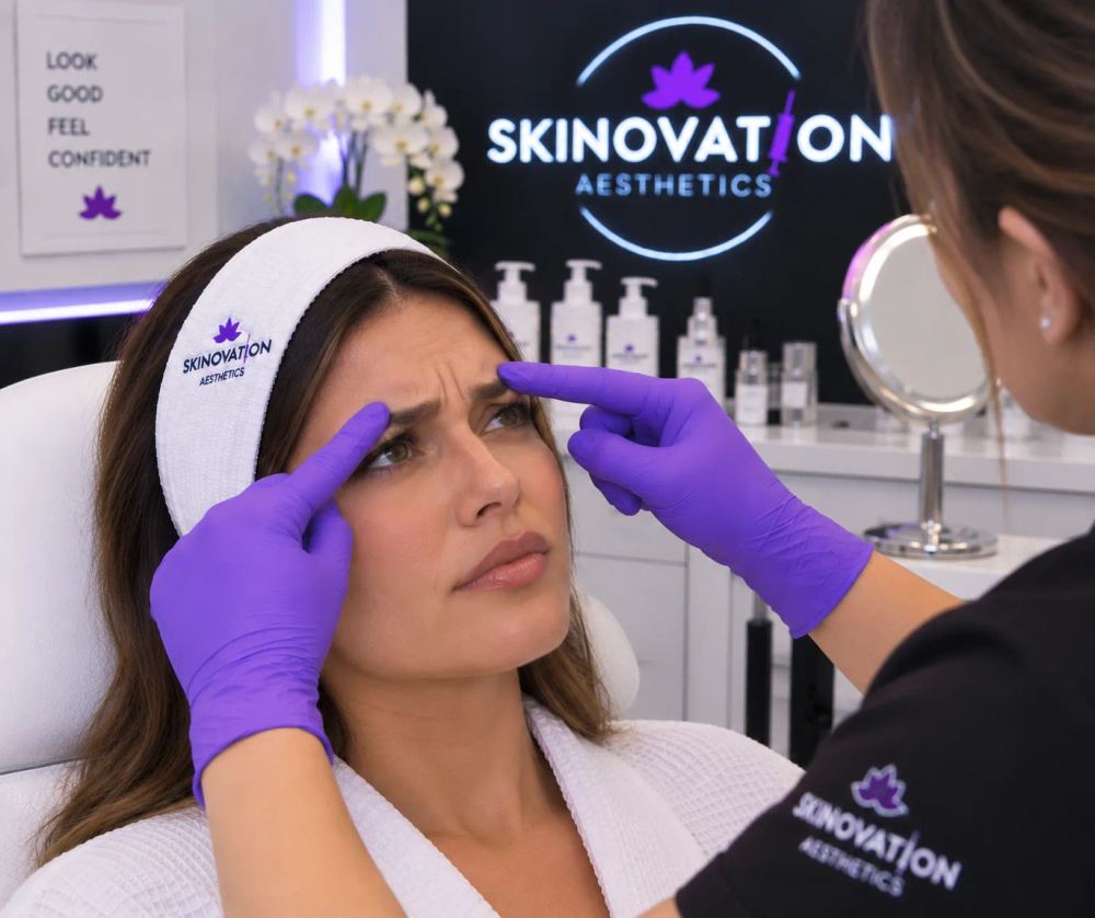 Provider consulting with a patient about frown-line Botox treatment at Skinovation Aesthetics in Katy, TX
