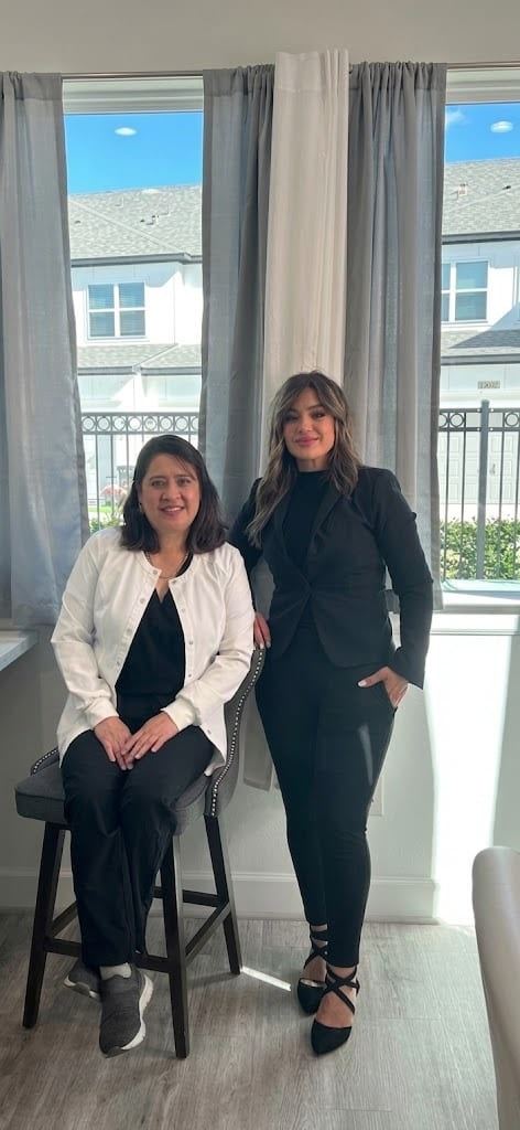 Rana standing with a nurse at Skinovation Aesthetics in Katy, Texas